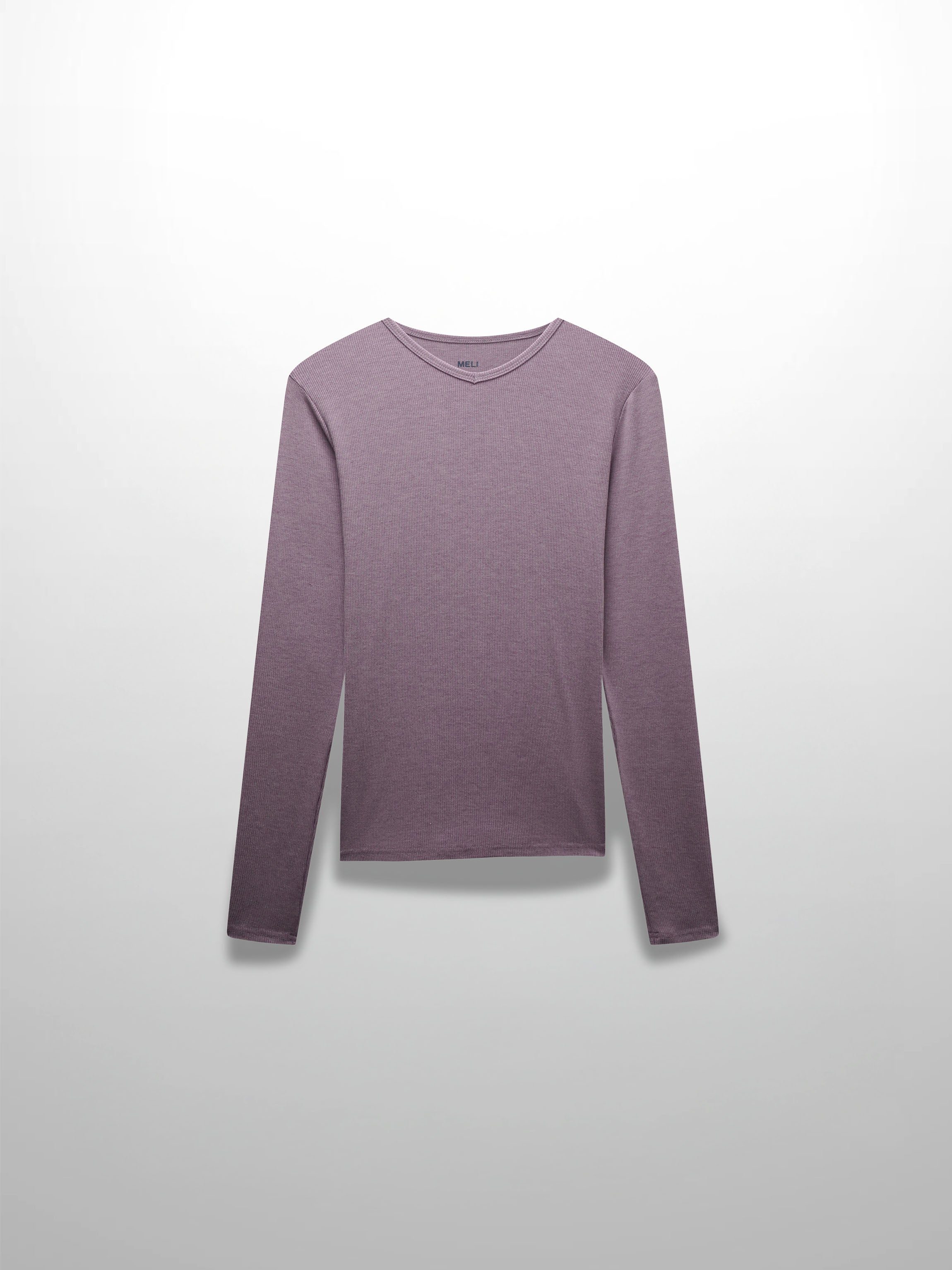 This is a full, front view of the long-sleeved, lavender-colored ribbed shirt. The garment is laid out flat against a white background.