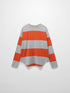 Front of a long-sleeved shirt with horizontal orange and grey stripes.