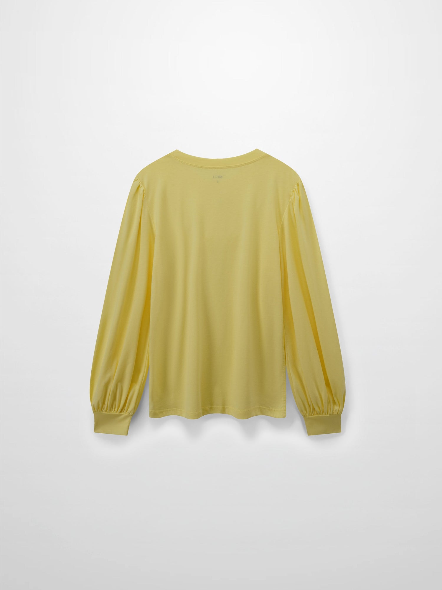 A full, back view of the pale yellow, long-sleeved shirt. The puffed shoulders and voluminous, gathered sleeves are visible from behind.
